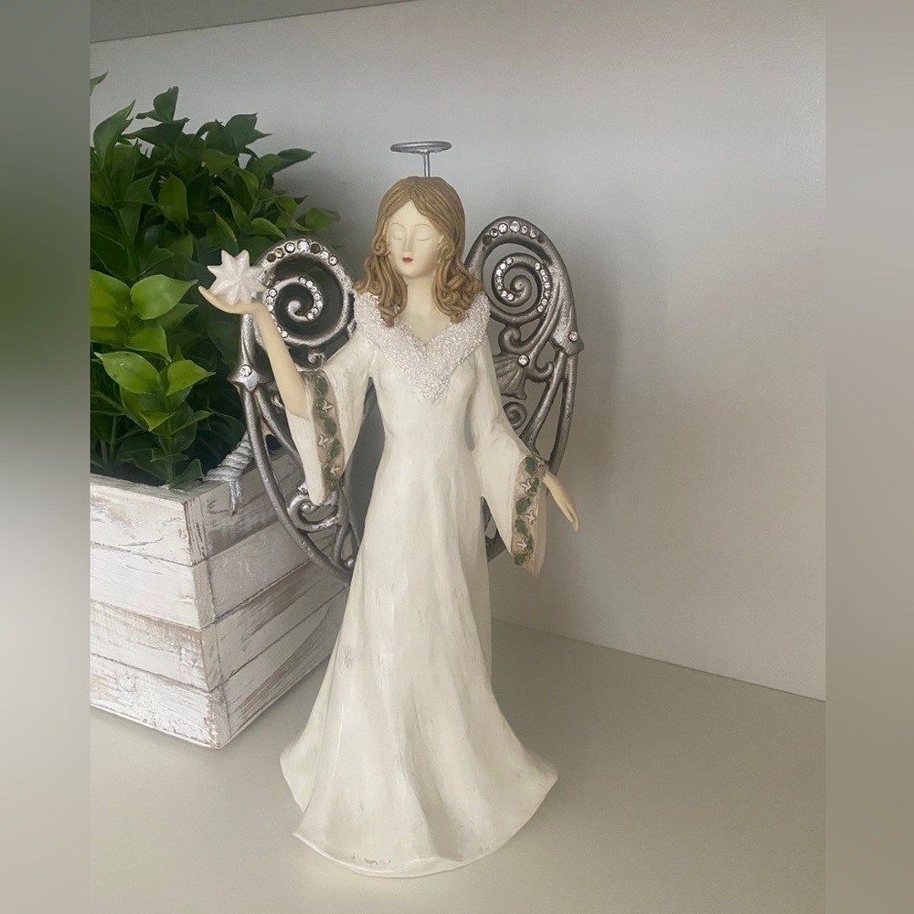 Grasslands Road Collection Resin Angel With Metal Wings Holding Frosted Star